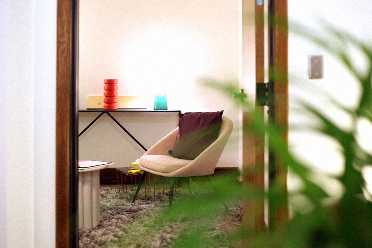 Custom Interior Design for Mental Health Therapy Service Showing Room With Comfortable Chair and Nice Lighting 